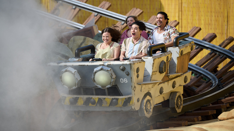 visitors ride Donkey Kong: Minecart Madness at Epic Universe