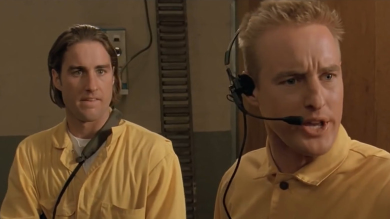 Luke and Owen Wilson as Anthony and Dignan, dressed in matching uniforms in Bottle Rocket