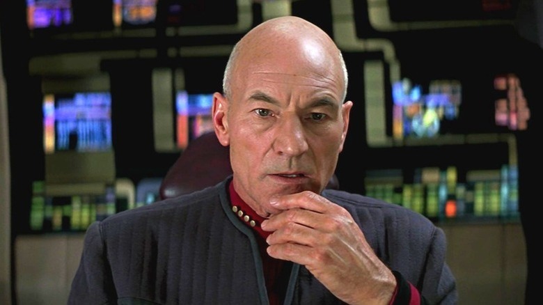 Jean-Luc Picard (Patrick Stewart) sits contemplatively in Star Trek: First Contact