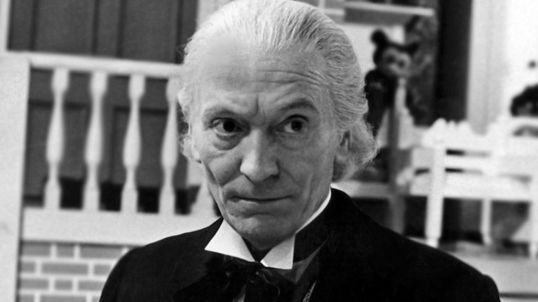 The First Doctor (William Hartnell) stands pensively outside in Doctor Who
