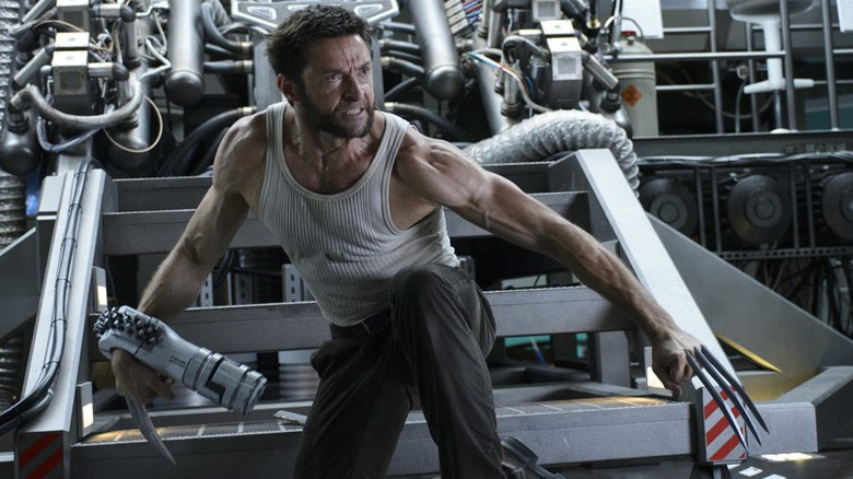 Hugh Jackman as Logan prepares for battle in a lab in The Wolverine