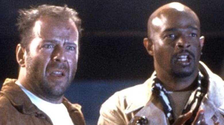 Bruce Willis as Joe Hallenbeck and Damon Wayans as Jimmy Dix witness an explosion in The Last Boy Scout