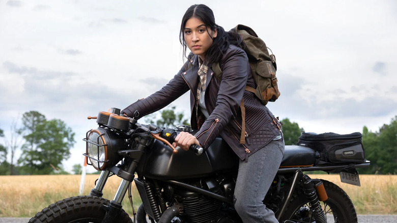 Alaqua Cox as Echo, riding a motorcycle on Echo