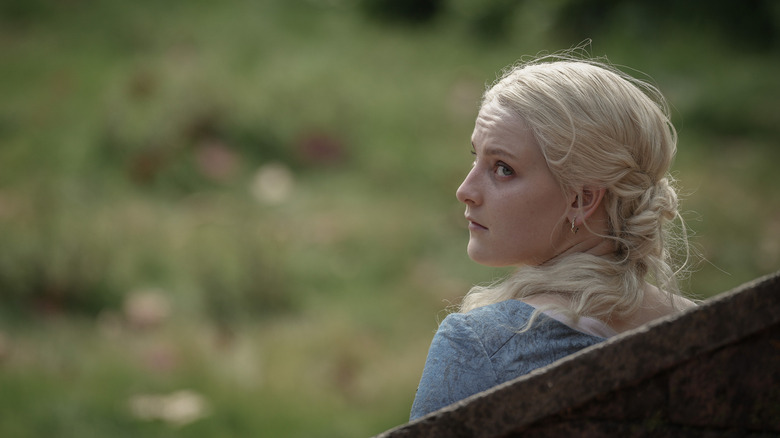 Helaena Targaryen ominously looking over her shoulder in House of the Dragon