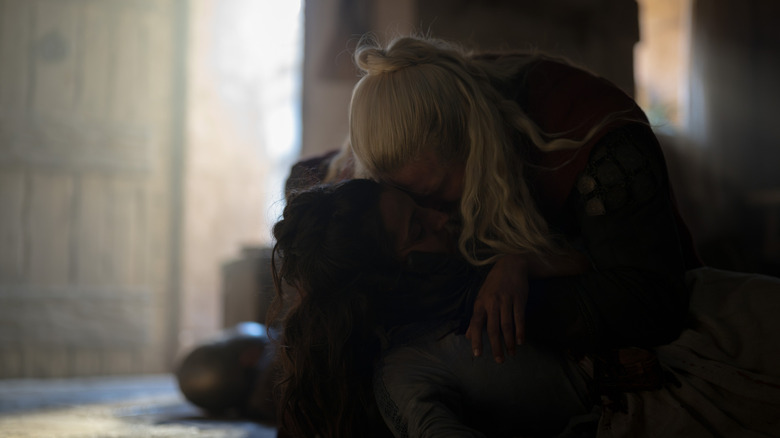 Hugh the Hammer holding the corpse of his estranged wife Kat in House of the Dragon
