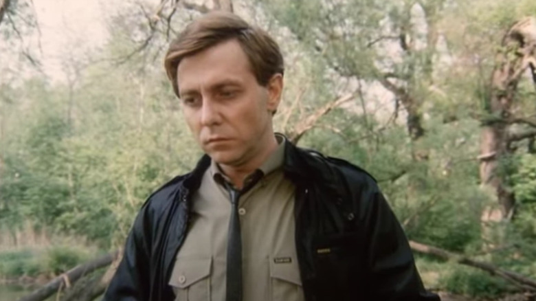 Oleg Vavilov's Andrew Harlan wearing a leather jacket and necktie on The End of Eternity