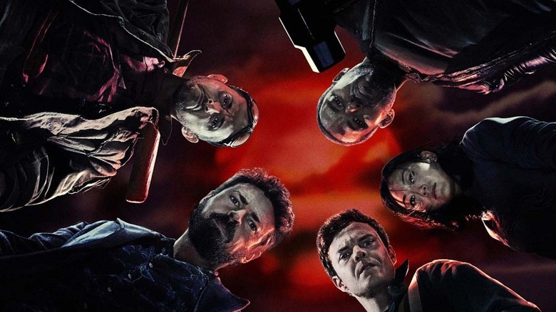The Boys Season 1 poster - low angle of Frenchie, MM, Kimiko, Hughie, and Butcher all standing in a circle