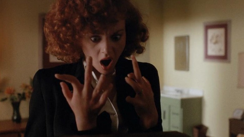 Neith Hunter as Kim, boggled by her fingers in Silent Night Deadly Night 4: Initiation