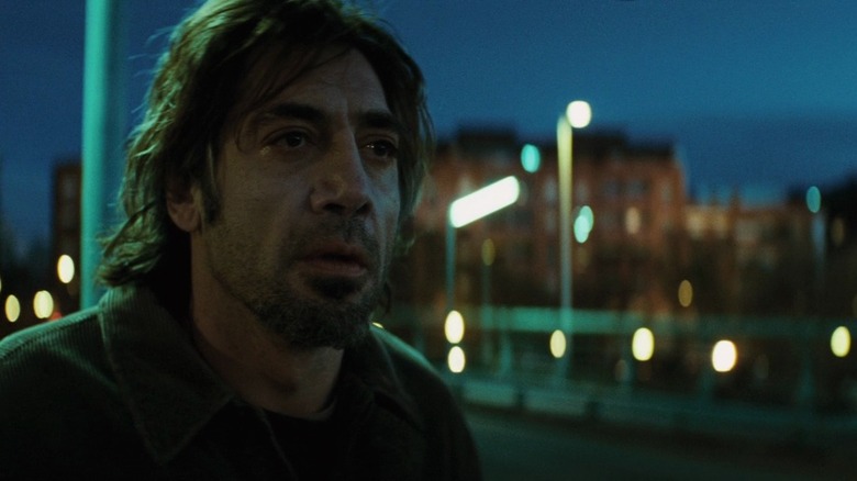 Javier Bardem's Uxbal looks distraught outside in Biutiful