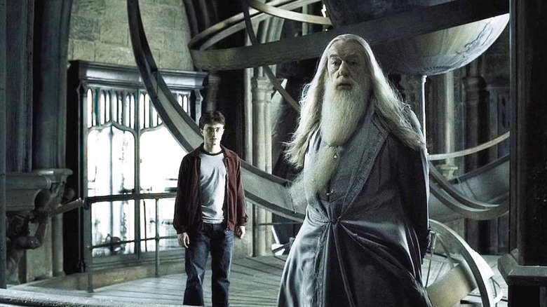 Dumbledore standing in front of Harry in the Astronomy Tower in Harry Potter and the Half-Blood Prince