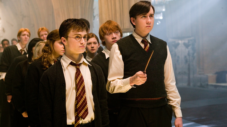 Harry and Neville practicing spells with Dumbledore's Army in Harry Potter and the Order of the Phoenix