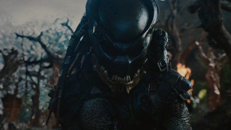 Yautja bearing teeth in Predators