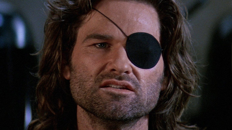 Kurt Russell as Snake Plissken wearing an eyepatch in Escape from L.A.