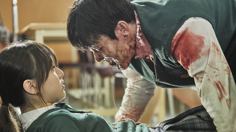 A zombie attacking a student 
