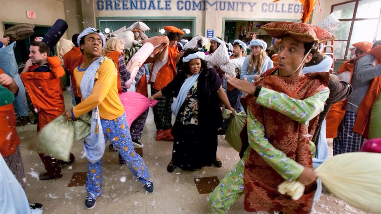 The students of Greendale having a pillow fight in Community