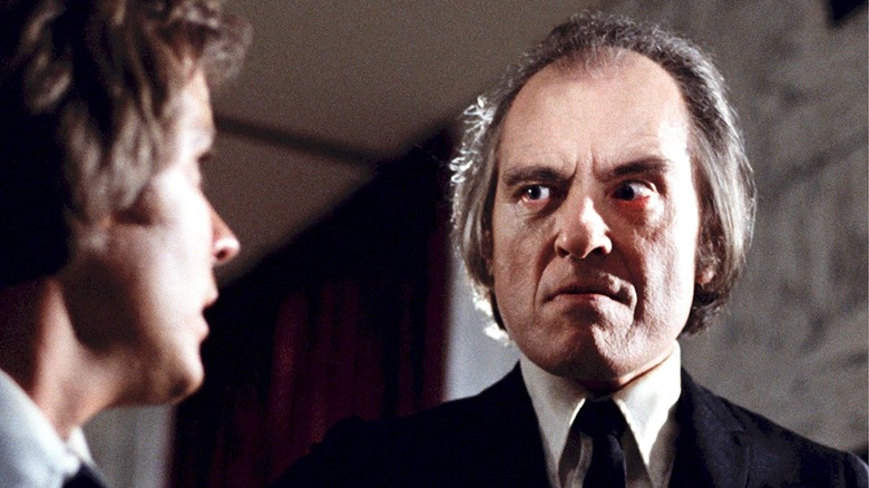 Phantasm man in suit stares