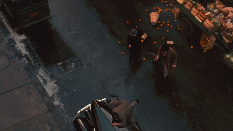 Oranges in the road after Don Corleone is shot in The Godfather