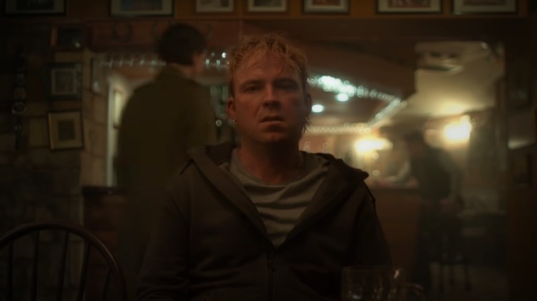 The blonde patron in Men