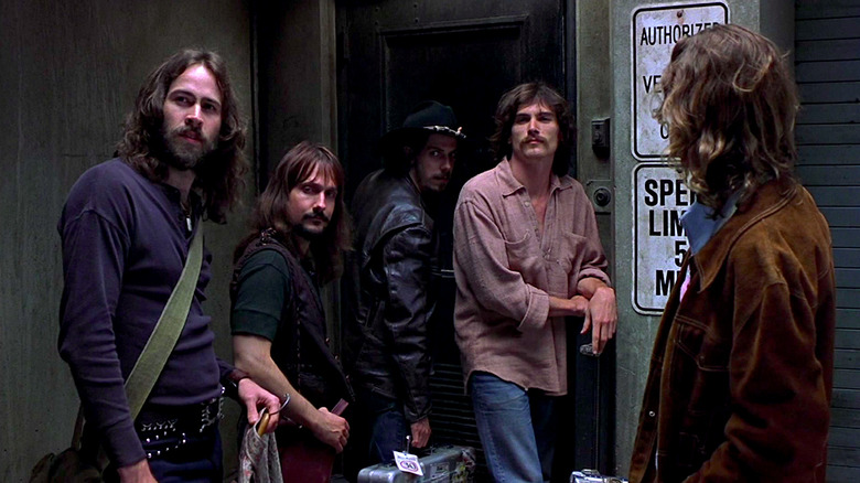 Jason Lee and Billy Crudup stand with the rest of their bandmates in Almost Famous