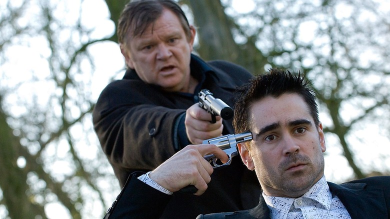 Colin Farrell and Brendan Gleeson aiming guns