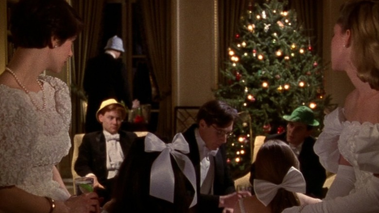 People near a Christmas tree