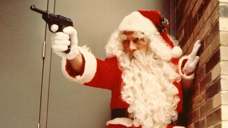 Santa Claus holding a gun