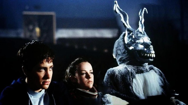 Donni, Grechen, and the rabbit sitting at the movie Theater in Doni Daro