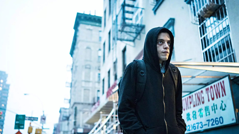 Elliott walking down a street in Mr. Robot