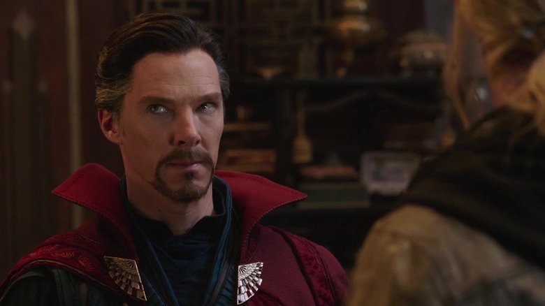 Dr. String (Benedict Combrus) speaks to the bull (Chris Hemsworth) in Thor: Rajnarok