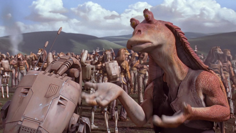 Jar Jar gesturing at a battle droid in Star Wars: The Phantom Menace