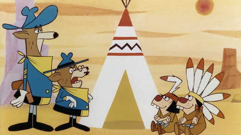 Go Go Gophers posted -- Sgt. Oakey Homa and Col. Kit Coyote standing across from Running Board and Ruffled Feather