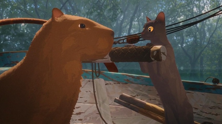 Copybara and black cat standing with each other on the boat in the stream