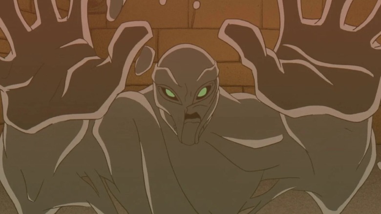 Clayface behind a cell wall in The Batman (2004)