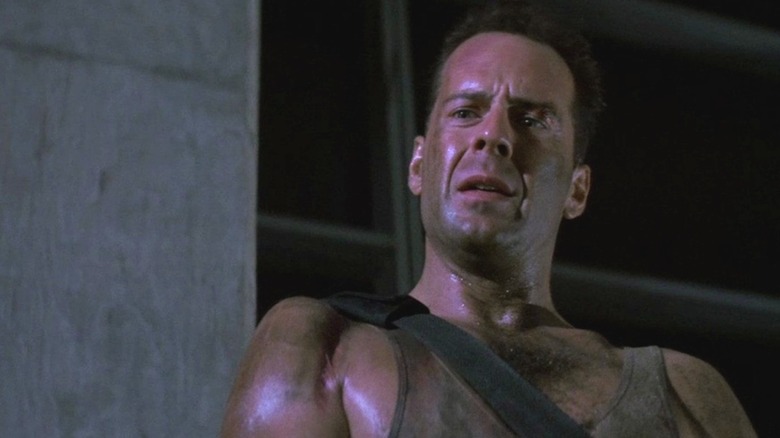 John McClane running around in his muddy vest in Die Hard