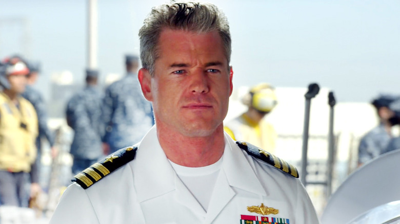 Eric Dane's Tom Chandler stands in uniform on the deck of a ship in The Last Ship