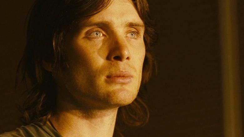 Cillian Murphy as Robert Kaba looks at the space in the sun