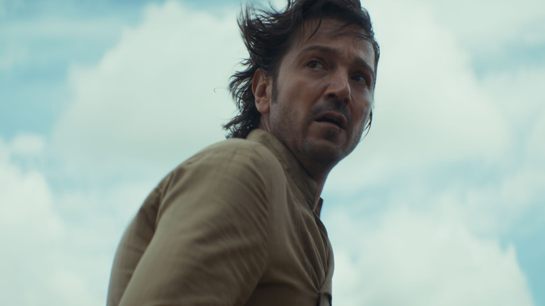 Cassian looks back scared in Andor