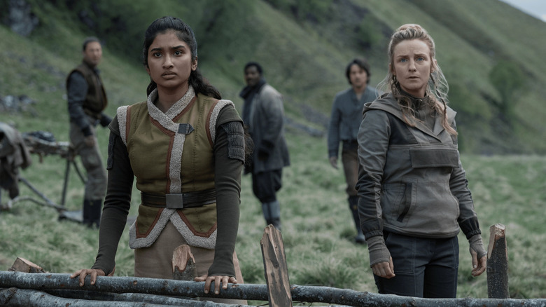 Cinta and Vel with the other rebels on Aldhani in Andor