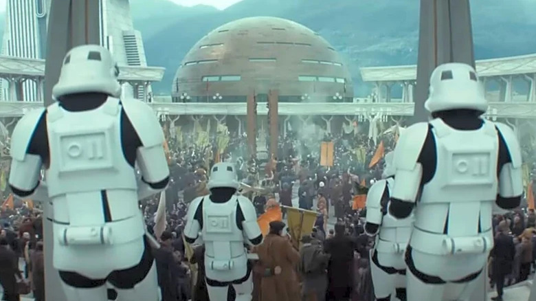 Stormtroopers approaching a crowd of demonstrators in Andor