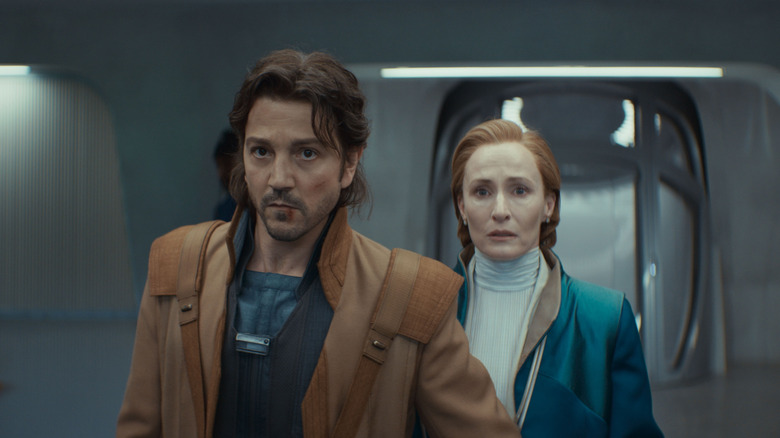 Cassian leads Mon Mothma out of the Senate in Andor season 2
