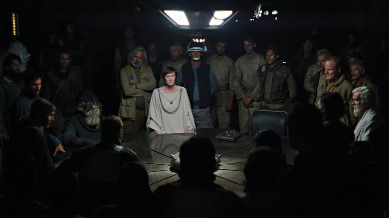 The rebellious high command gathers around a table in Rogue One