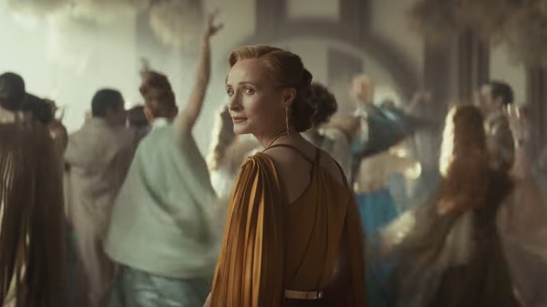 Mon Mothma looking over her shoulder sadly at Leida's wedding in Andor season 2
