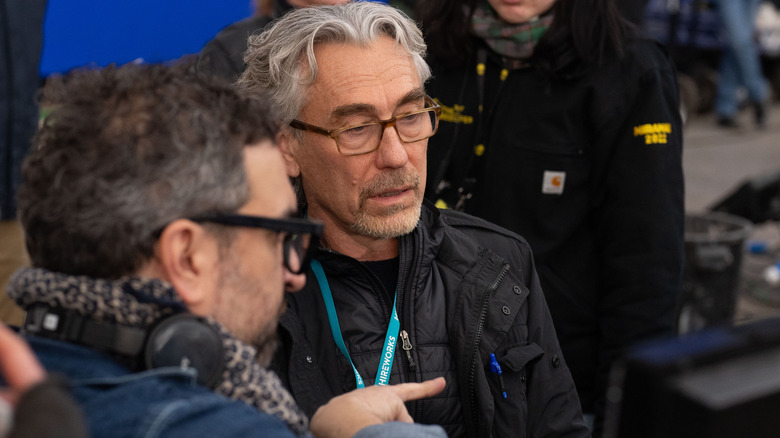 Tony Gilroy directing from the set of Andor season 2 in a behind-the-scenes photo