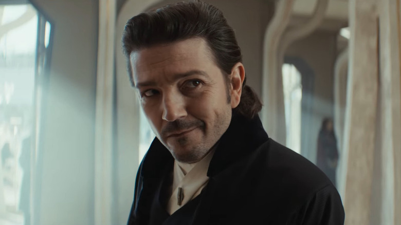 Cassian Andor smiles in disguise in Andor