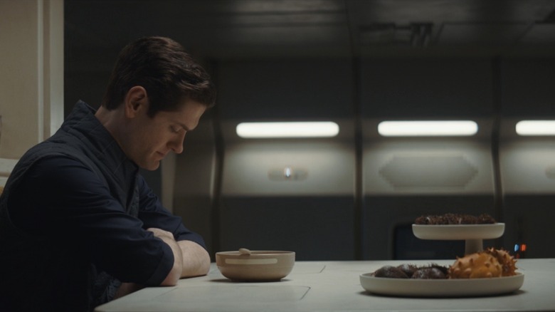 Syril eats blue-milk cereal in front of a plate of meilooruns
