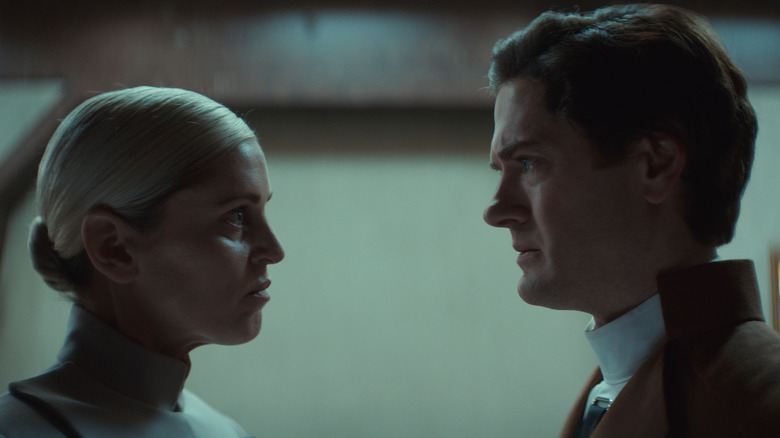 Denise Gough as Supervisor Dedra Meero and Kyle Soller as Syril Karn sharing an intense look in Andor season 2