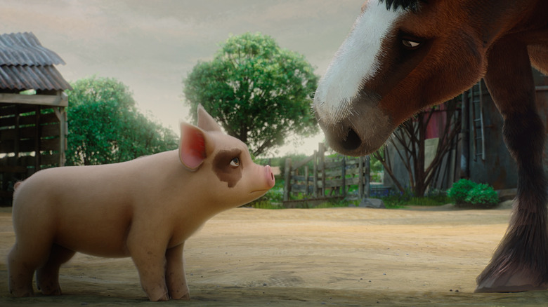 Lucky looking up at Boxer in Animal Farm (2026)