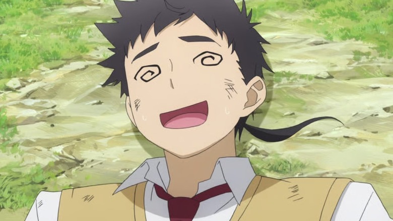 Tenchi Masaki lies in the dirt dazed with spirals for eyes in Ai, Tenchi Muyo!