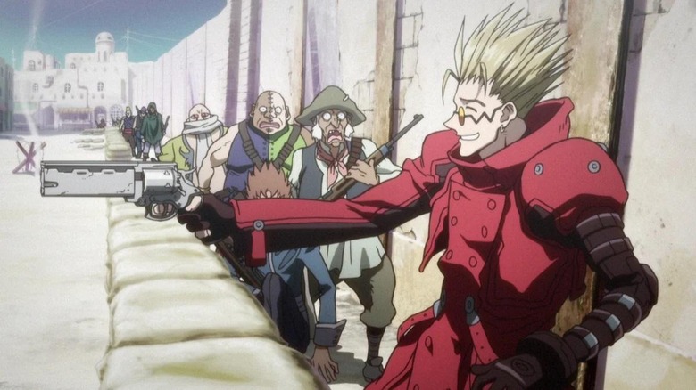 Vash takes aim while smiling