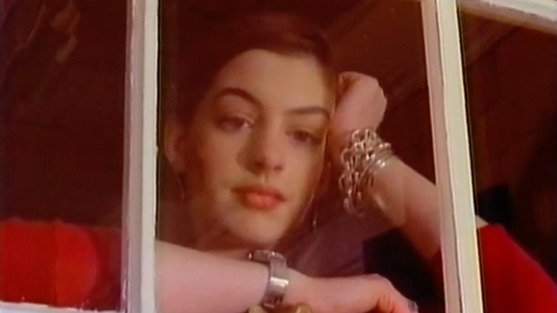 Anne Hathaway as Meghan staring out a window in Get Real